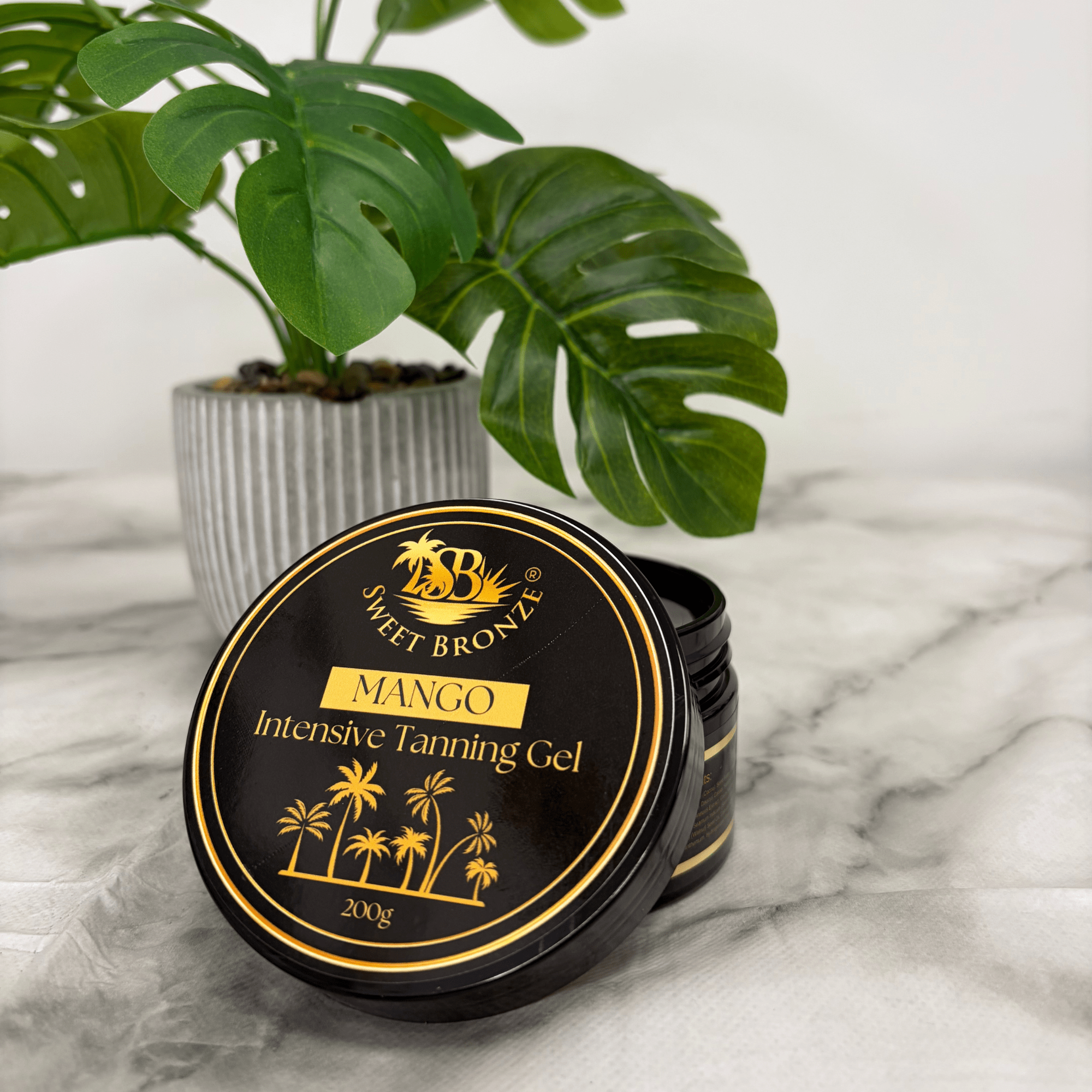 Mango Tanning Gel on a marble surface