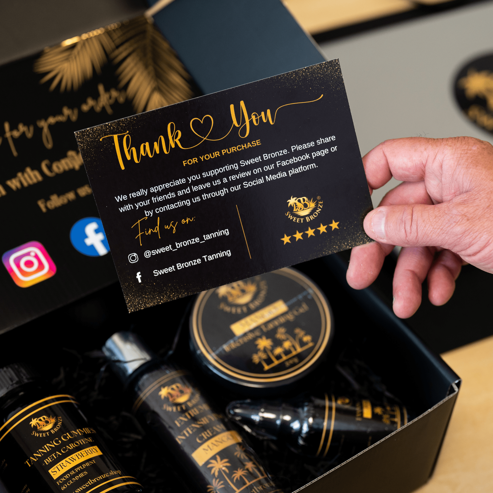 Box of tanning enhancers wit a thank you card